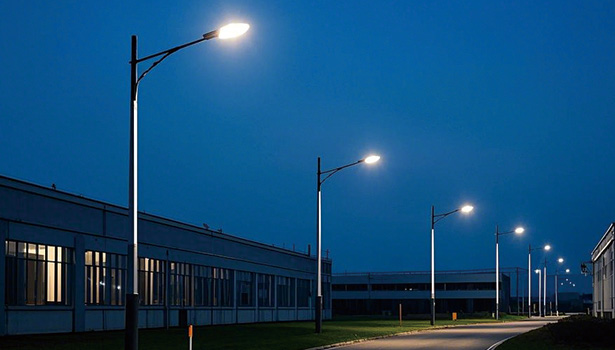 Rural road illuminated by solar-powered street lights