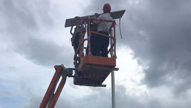 Installation of solar street lights along a rural road