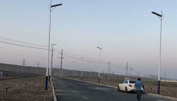 Urban road with installed solar street lights
