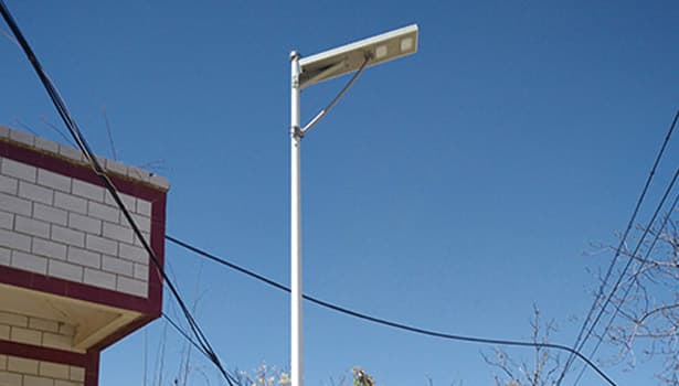 Solar street light on a suburban road, contributing to road safety and visibility