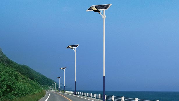 Waterproof solar street lights installed along a coastal road