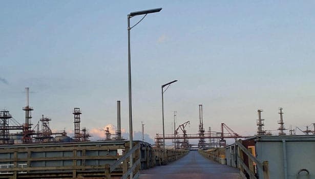 Solar street lights deployed in an industrial zone, demonstrating durability and functionality in industrial environments