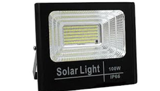 Close-up of 100-watt solar LED floodlight with solar panel and high-brightness LED