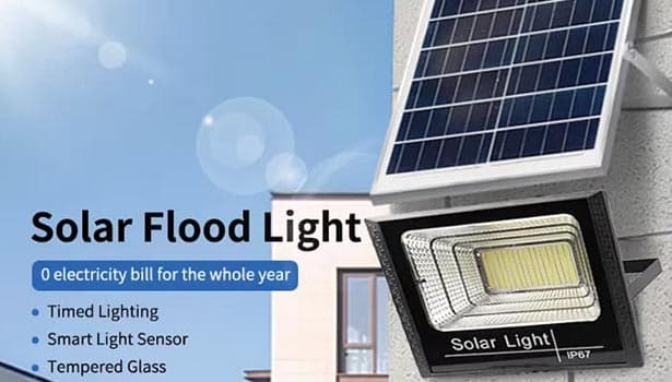 100-watt solar LED floodlight illuminating a garden path at night
