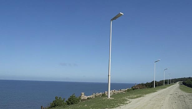 Solar street lights along coastal road with ocean view - Nokin Solar Products