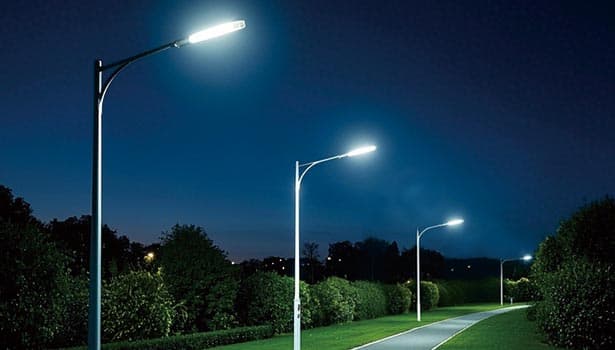 Bright solar street lights lighting up pathway at night