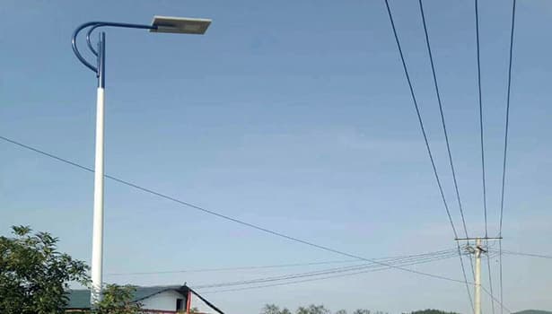 Solar street light installed outdoors in daytime under clear sky